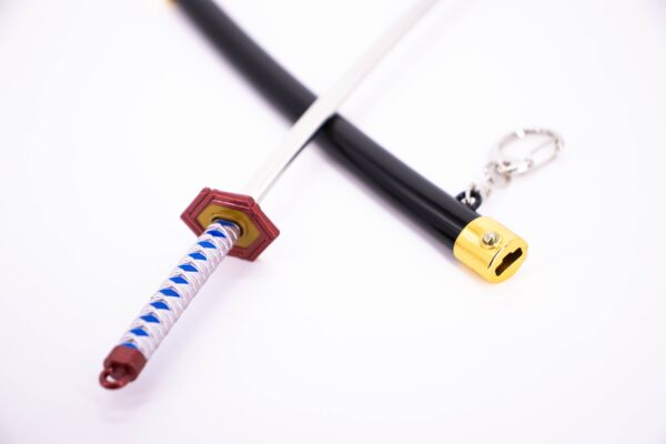 DEMON SLAYER – GIYU TOMIOKA’S NICHIRIN SWORD KEYCHAIN - Image 5