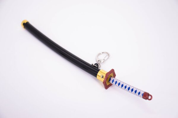 DEMON SLAYER – GIYU TOMIOKA’S NICHIRIN SWORD KEYCHAIN - Image 6