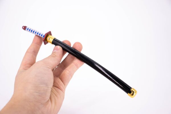 DEMON SLAYER – GIYU TOMIOKA’S NICHIRIN SWORD KEYCHAIN - Image 8