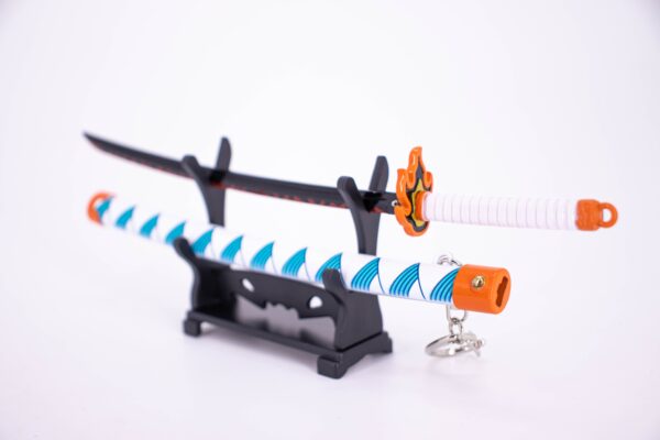 DEMON SLAYER – KYOJURO RENGOKU’S NICHIRIN SWORD KEYCHAIN - Image 2