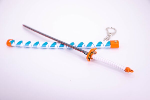 DEMON SLAYER – KYOJURO RENGOKU’S NICHIRIN SWORD KEYCHAIN - Image 4