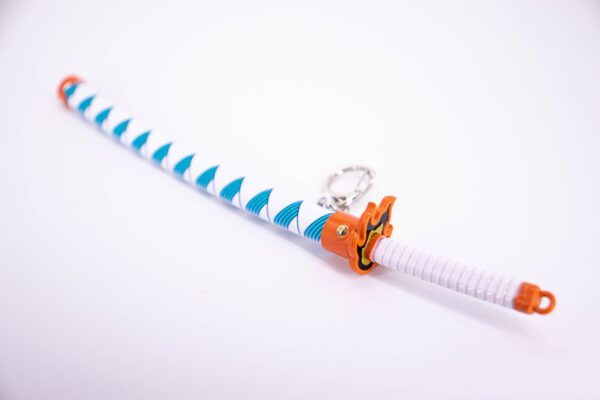 DEMON SLAYER – KYOJURO RENGOKU’S NICHIRIN SWORD KEYCHAIN - Image 6