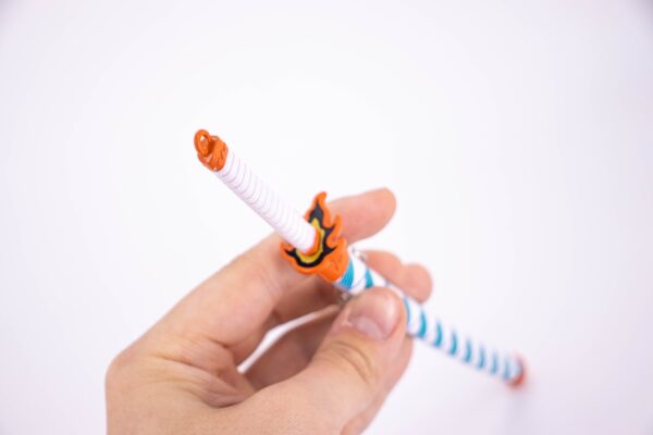 DEMON SLAYER – KYOJURO RENGOKU’S NICHIRIN SWORD KEYCHAIN - Image 7